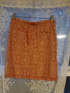 Weavers Orange Printed Drawstring Mini Skirt. 13 Weist
